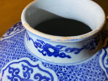 A Chinese blue and white 'lotus scroll' jar, dated 1587, Wanli mark and of the period