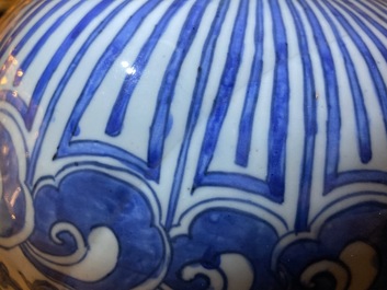 An imperial Chinese blue and white 'lotus scroll' meiping vase, Wanli mark and of the period