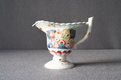 A Chinese famille rose 'Tobacco leaf' helmet-shaped jug, Qianlong