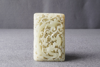 A Chinese reticulated pale celadon jade 'dragon and phoenix' carving, Ming