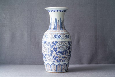 A Chinese blue, white and underglaze red vase, 19th C.