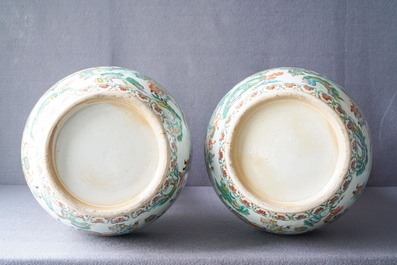 A pair of Chinese Canton famille verte vases with dragon handles, 19th C.