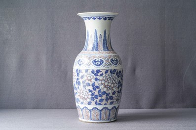 A Chinese blue, white and underglaze red vase, 19th C.