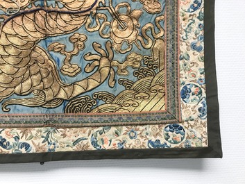 A Chinese gold-thread embroidered silk dragon wall tapestry, 19th C.