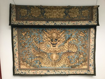 A Chinese gold-thread embroidered silk dragon wall tapestry, 19th C.