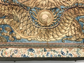 A Chinese gold-thread embroidered silk dragon wall tapestry, 19th C.