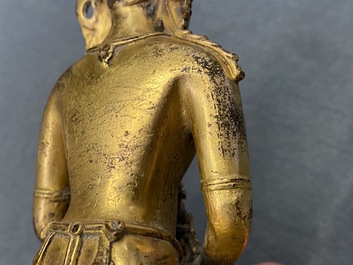 A Chinese coral- and turquoise-inlaid gilt bronze figure of Buddha Amitayus, 18/19th C.