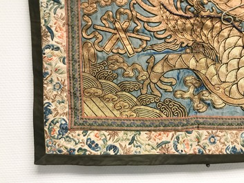 A Chinese gold-thread embroidered silk dragon wall tapestry, 19th C.