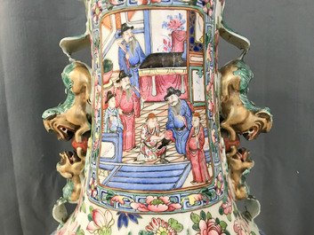 A pair of large Chinese famille rose court scene vases, 19th C.