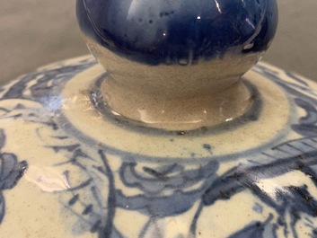 A Chinese blue and white vase and cover with figural design, Wanli