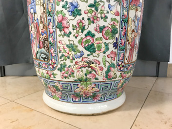 A pair of large Chinese famille rose court scene vases, 19th C.