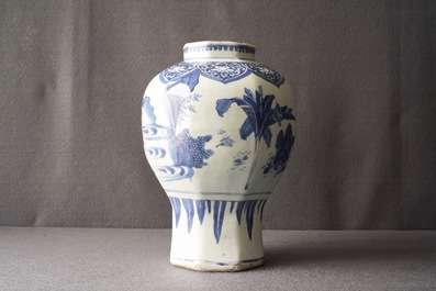 A Chinese blue and white baluster vase with figures in a landscape, Transitional period