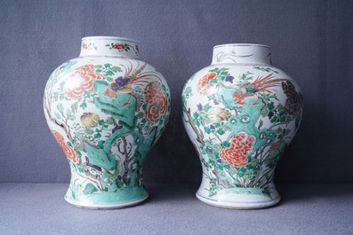 A pair of Chinese famille verte vases with birds and insects, Kangxi