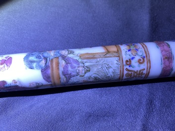 A Chinese famille rose opium pipe with silk pouch, 19th C.