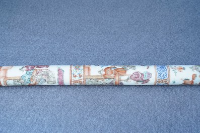 A Chinese famille rose opium pipe with silk pouch, 19th C.