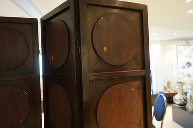 A Chinese wooden room divider with blue and white 'dragon' plaques, 19th C.