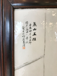 Une armoire en bois sculpt&eacute; orn&eacute;e de 23 plaques en porcelaine de Chine qianjiang cai, 19/20&egrave;me