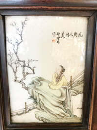 Une armoire en bois sculpt&eacute; orn&eacute;e de 23 plaques en porcelaine de Chine qianjiang cai, 19/20&egrave;me