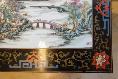 Two Chinese famille rose landscape plaques in a lacquered chest, marked Wang Yeting, 19/20th C.