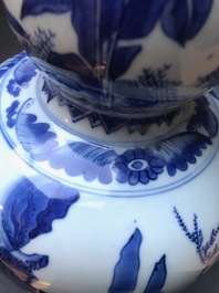 A Chinese blue and white double gourd vase, Transitional period