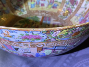 A pair of Chinese Canton famille rose vases and a bowl, 19th C.