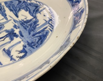A fine Chinese blue and white 'river landscape' charger, Jiajing