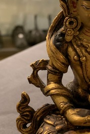 Five Sino-Tibetan gilt bronze Buddha figures, 19/20th C.