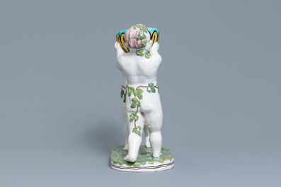 Een polychrome aardewerken groep met twee Bacchusfiguren in Brusselse stijl, Geo Martel, D&egrave;svres, begin 20e eeuw