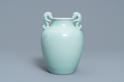 A Chinese monochrome dragon-handled celadon vase, Qianlong mark, 19/20th C.