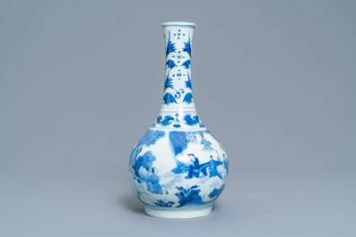 A Chinese blue and white bottle vase with figures in a landscape, Transitional period