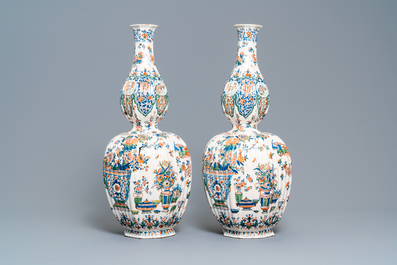 A pair of exceptional large ribbed Dutch Delft cashmere palette vases with flower vases, ca. 1700