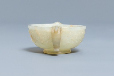 A Chinese pale celadon and russet jade two-handled bowl, prob. Ming