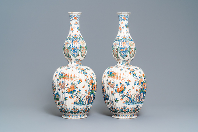 A pair of exceptional large ribbed Dutch Delft cashmere palette vases with flower vases, ca. 1700