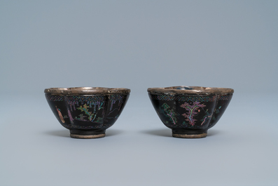 Three Chinese lac burgaut&eacute; saucers and two cups, Kangxi