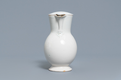 A white Delftware jug and cover, France, 18th C.