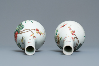 A pair of Chinese famille rose bottle vases, 19th C.