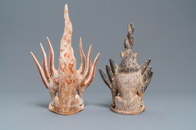 A pair of Chinese painted pottery models of 'earth spirits', Tang