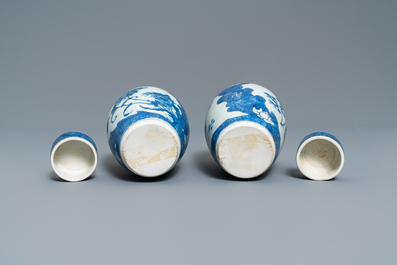 A pair of Chinese blue and white vases and covers with floral design, Hatcher cargo shipwreck, Transitional period