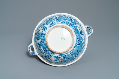 A large Dutch Delft blue and white two-handled chinoiserie bowl, 18th C.