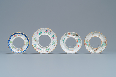 Two Chinese famille rose teapots and four covered bowls on stands, 19th C.