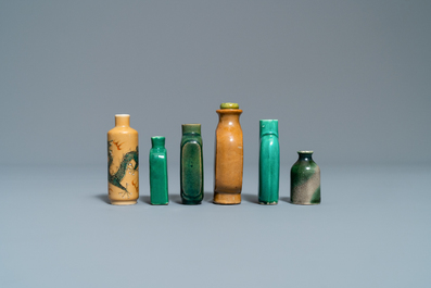 Twelve Chinese monochrome and sancai-glazed snuff bottles, 19/20th C.