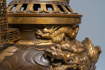 A large Japanese parcel-gilt bronze okimono of Benkei holding a koro or incense burner, attr. to Miyao Eisuke, Meiji, ca. 1900