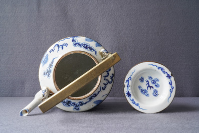 A large Chinese blue and white Vietnamese market 'Bleu de Hue' teapot with qilins, 19th C.