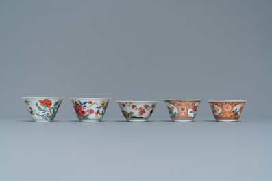 Five Chinese famille rose cups and saucers, Yongzheng/Qianlong