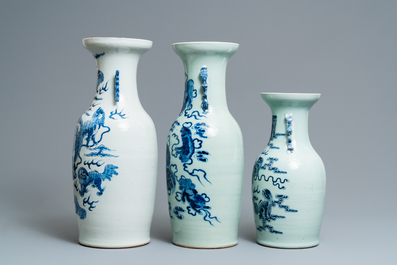 Three Chinese blue and white and celadon-ground 'Buddhist lion' vases, 19th C.