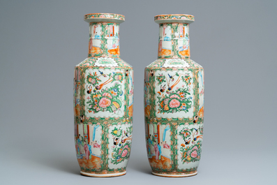 A pair of Chinese Canton famille rose rouleau vases, 19th C.