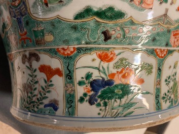 A pair of large Chinese famille verte vases and covers, Kangxi