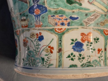 A pair of large Chinese famille verte vases and covers, Kangxi