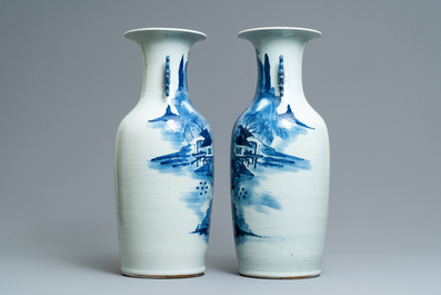 A pair of Chinese blue and white 'landscape' vases, 19th C.