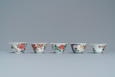 Thirteen various Chinese saucers and nine cups, Kangxi/Qianlong